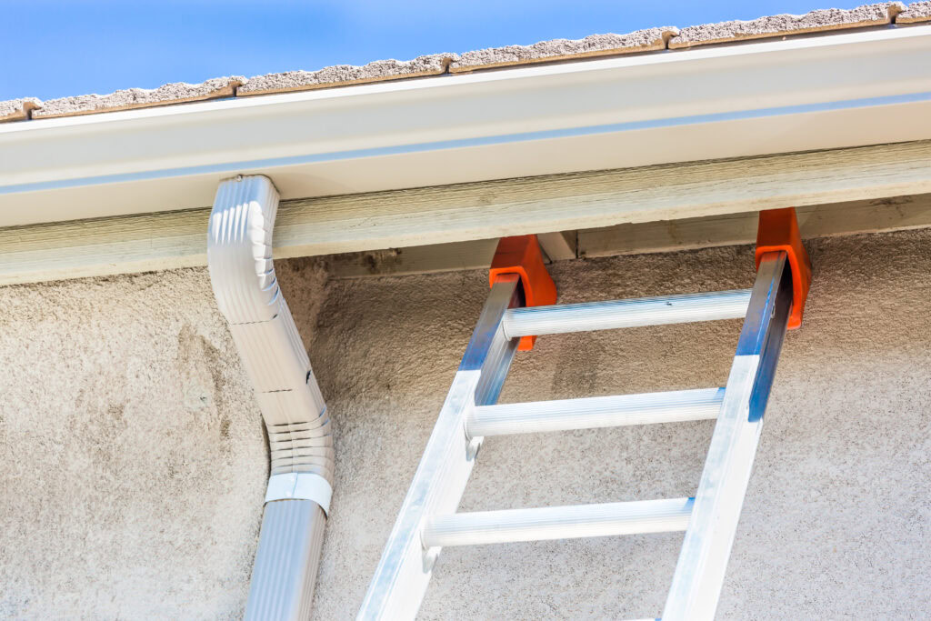 Fall Roof and Gutter Cleaning Guide for WA Homes House with New Seamless Aluminum Rain Gutters.